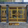 Cổng nhôm đúc họa tiết trống đồng đẹp