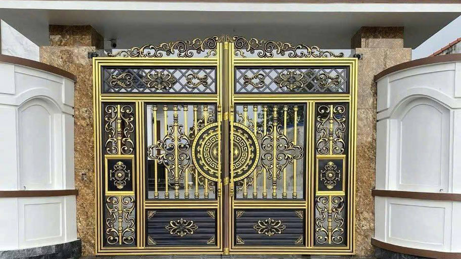 Mẫu cổng nhôm đúc áp lực hoa văn trống đồng